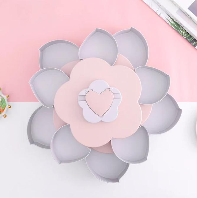 BloomBite™ | Drehender Blumensnack-Speicher